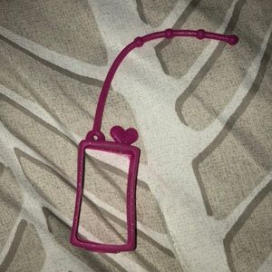 Hand sanitizer holder